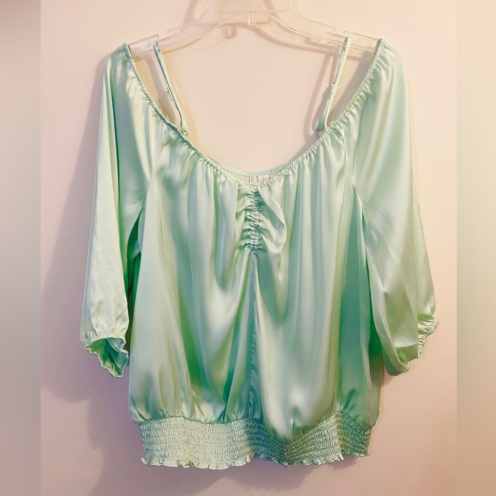 Light green silky blouse